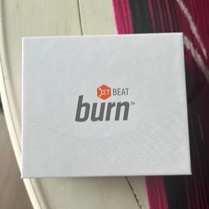 Orange Theory fitness arm band. Includes charger and 2 extra bands. Never used.